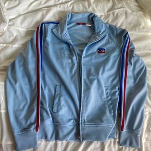 red, white, and baby blue levi’s jacket